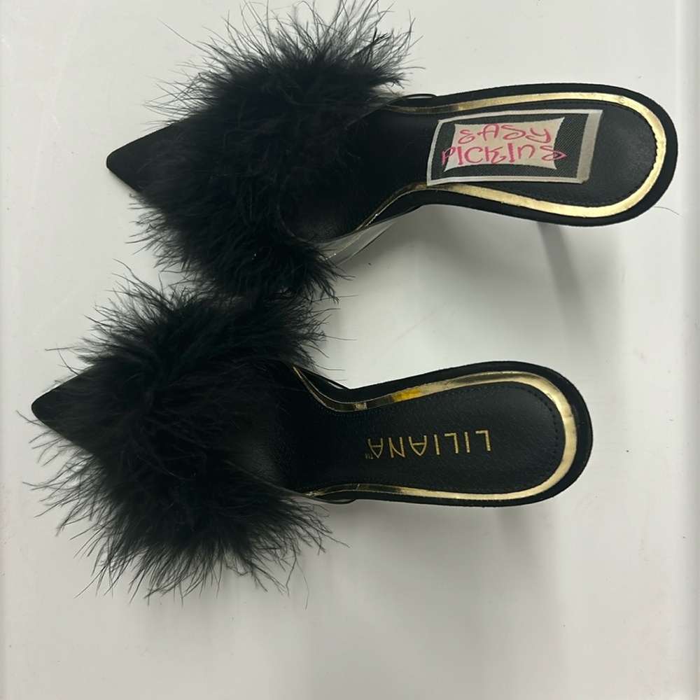 Like new Feathered mule heels